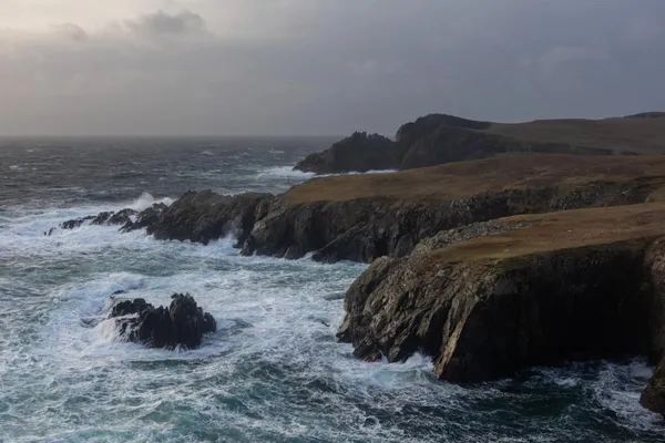 Stormy seas and cliffs