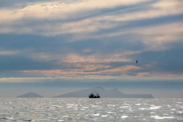Small boat at sea