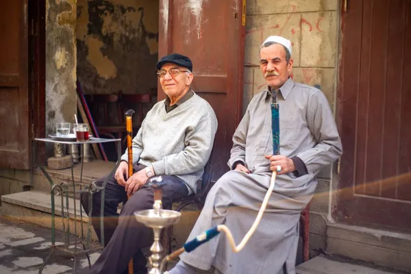 Men smoking narghile